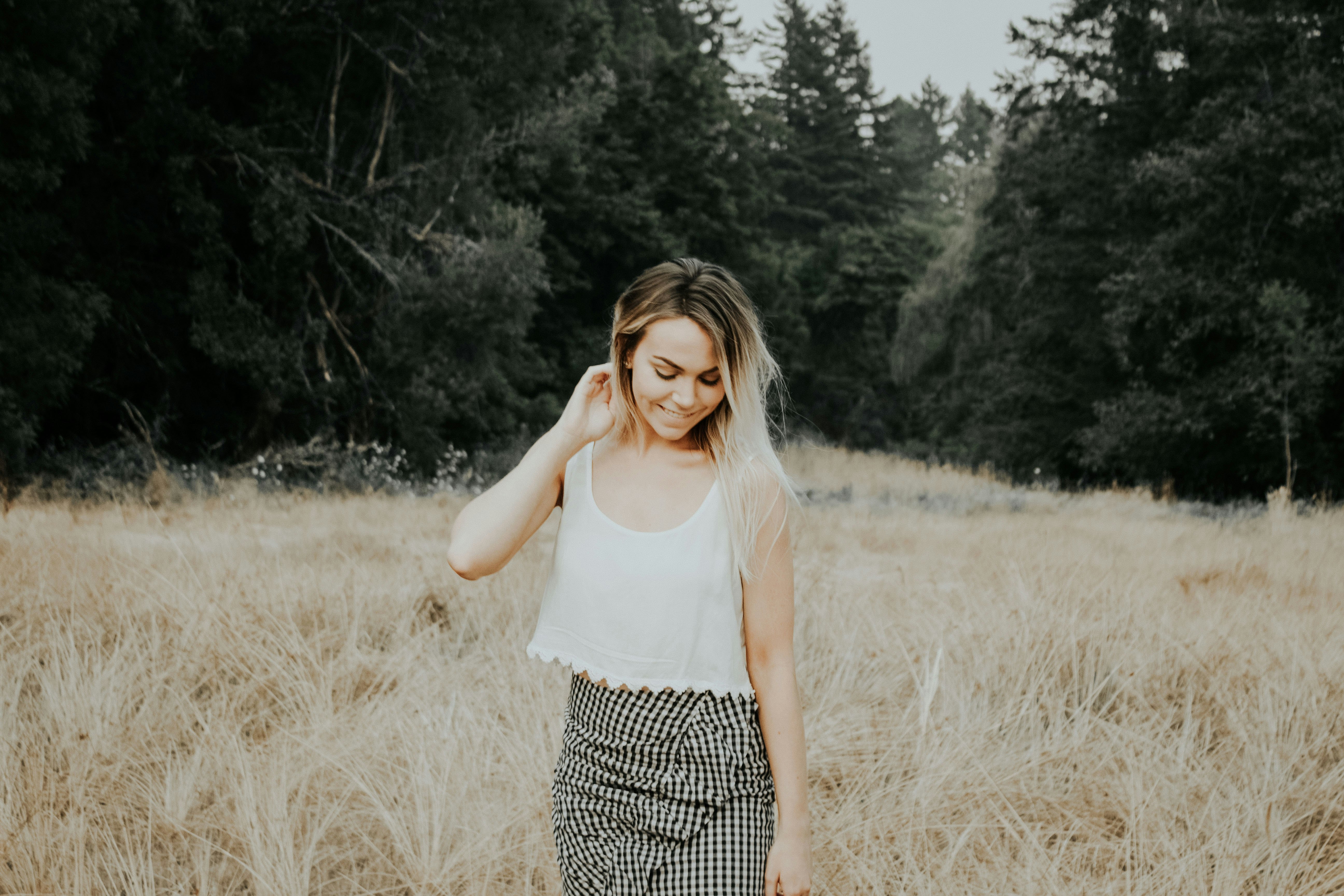 woman standing at the field during day